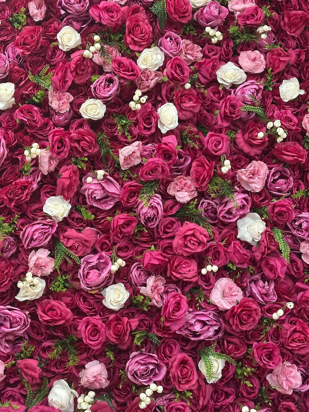 Pink Romance flower wall — close-up detail of pink, burgundy, and white silk roses