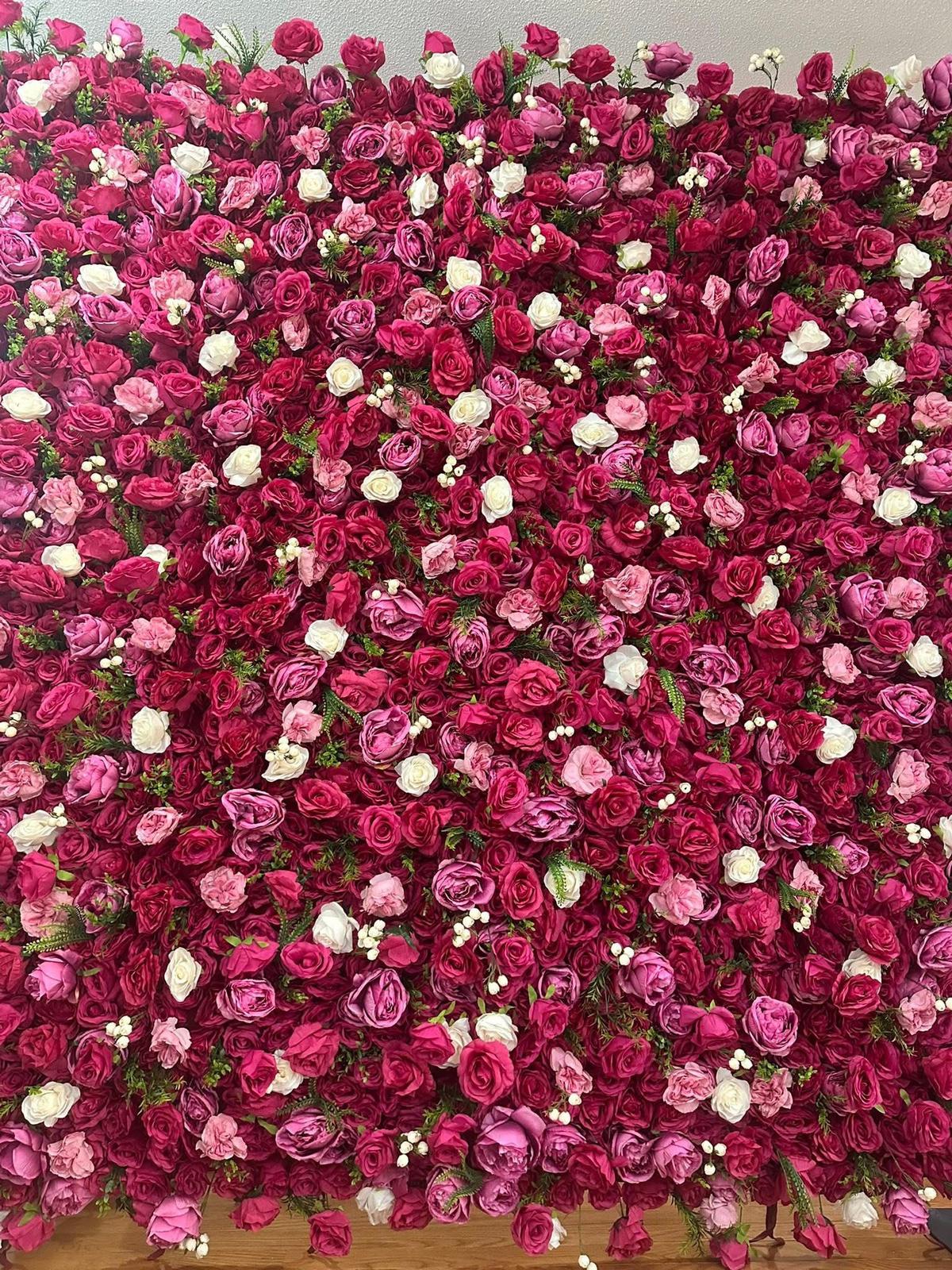 Pink Romance flower wall — lush fuchsia and blush blooms with baby's breath accents