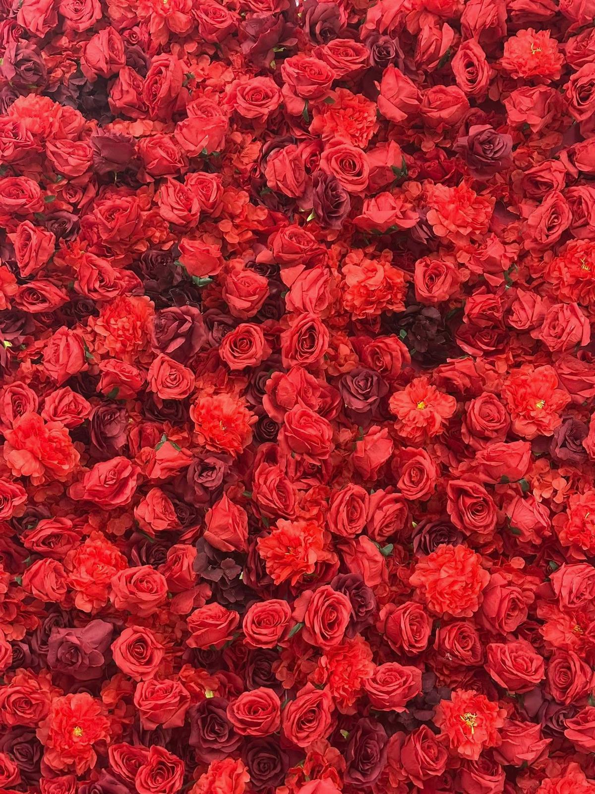Red Passion flower wall — rich crimson and burgundy silk blooms texture