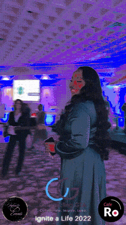 Guest turning towards the 360 booth camera on the dance floor
