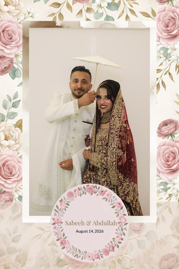 Selfie booth photo of a couple in wedding dress framed by a floral overlay with the couple's names and event date