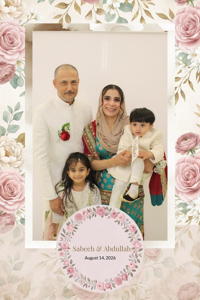 Selfie booth photo of a family of five framed by the same floral overlay with the couple's names and event date