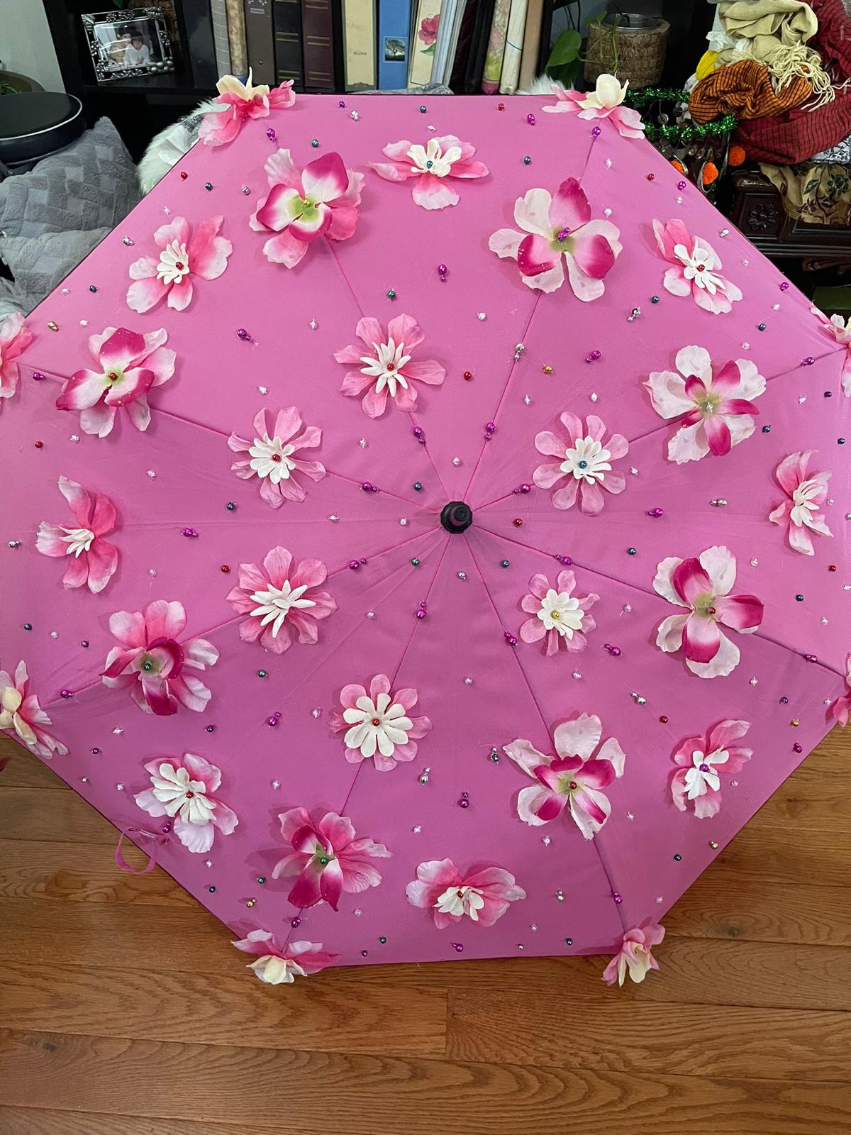 Pink floral umbrella with blush and white flowers
